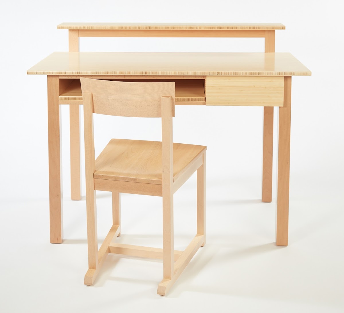 Wooden chair and desk for new North Hall RISD residence, by Professors John Dunnigan MFA 80 ID and Lothar Windels BID 96