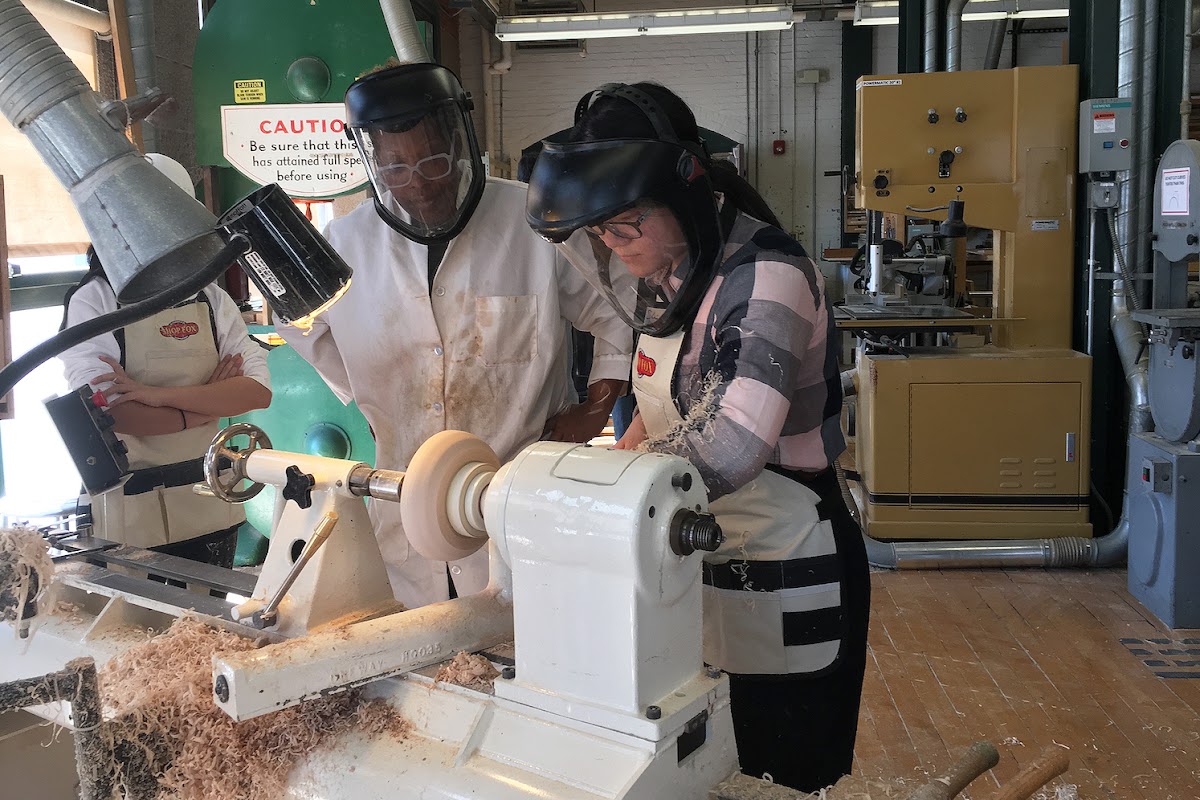 Jess Brown MID 09 in the wood shop with student