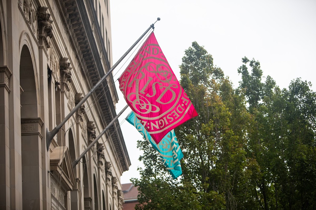 RISD flags in flight