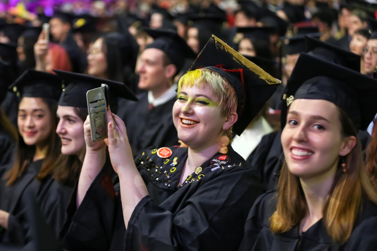 Smiling students at commencement