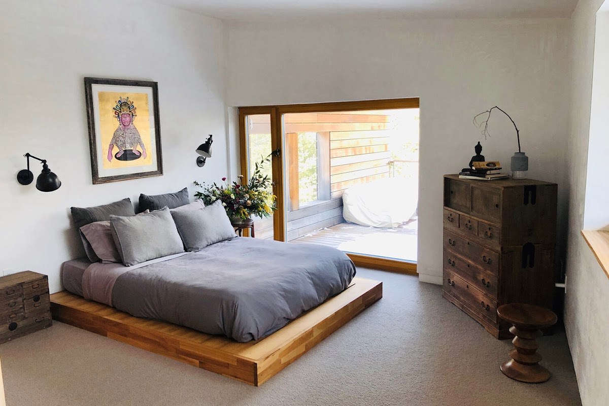 Bedroom in an energy-efficient home by Laura Briggs BArch 82, Jonathan Knowles BArch 84, and Jonsara Ruth 92 ID.