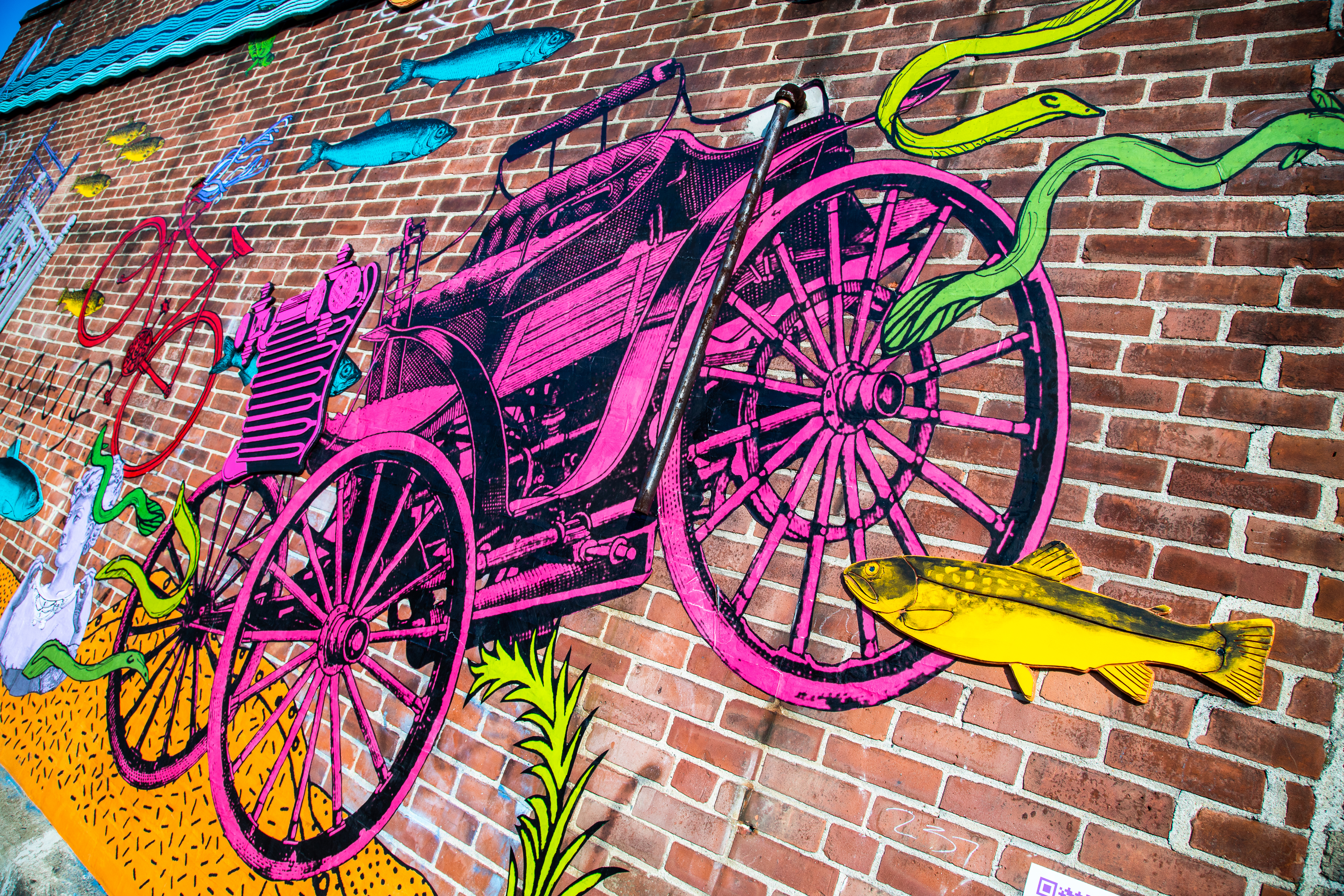 Old fashioned car portion of Keri King 05 IL's  mural—What's in the River?—in the Olneyville section of Providence