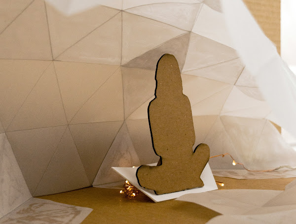 Cardboard model of a person sitting