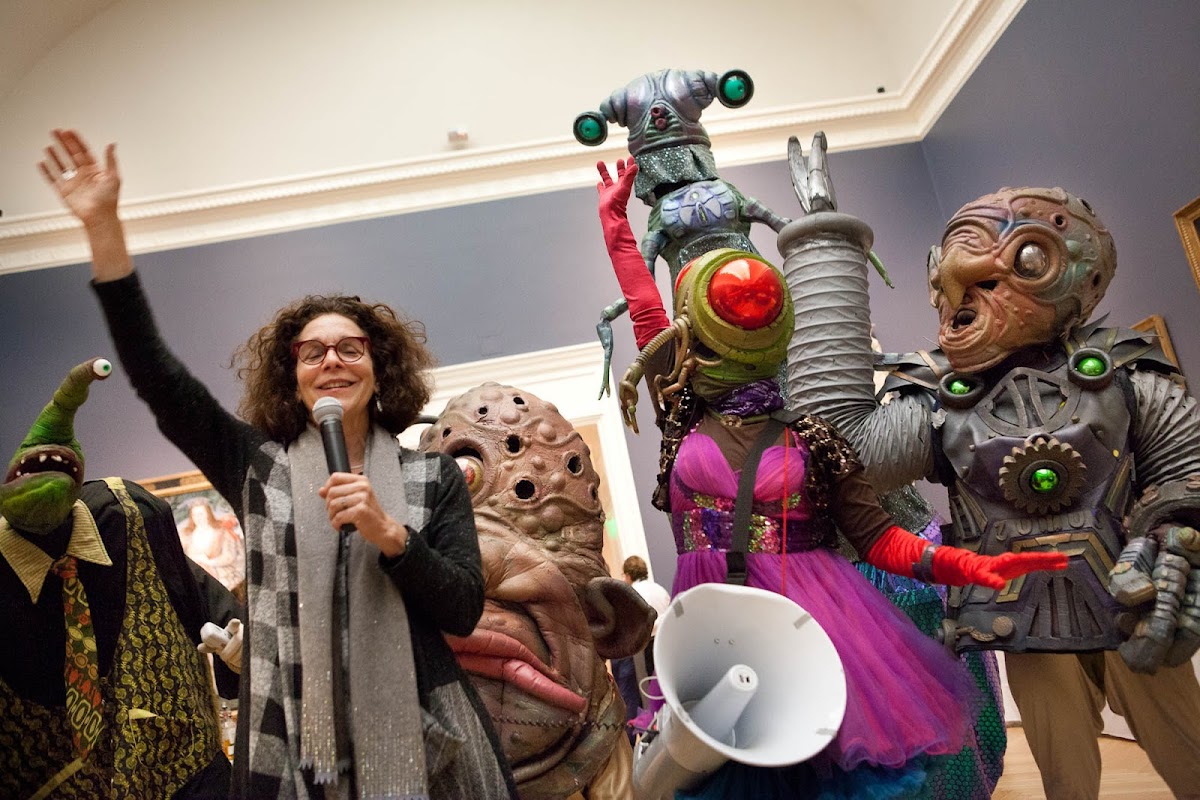President Rosanne Somerson with Big Nazo creatures in the museum