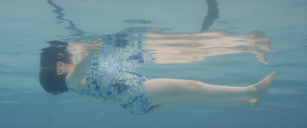 Woman floating in water