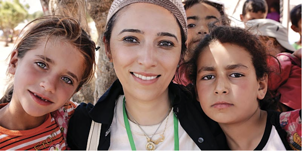 Lina Sergie Attar MArch 01 with Syrian children