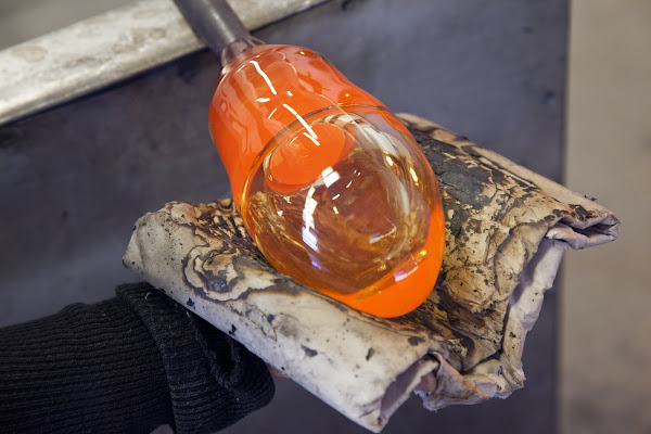 Hot, molten glass