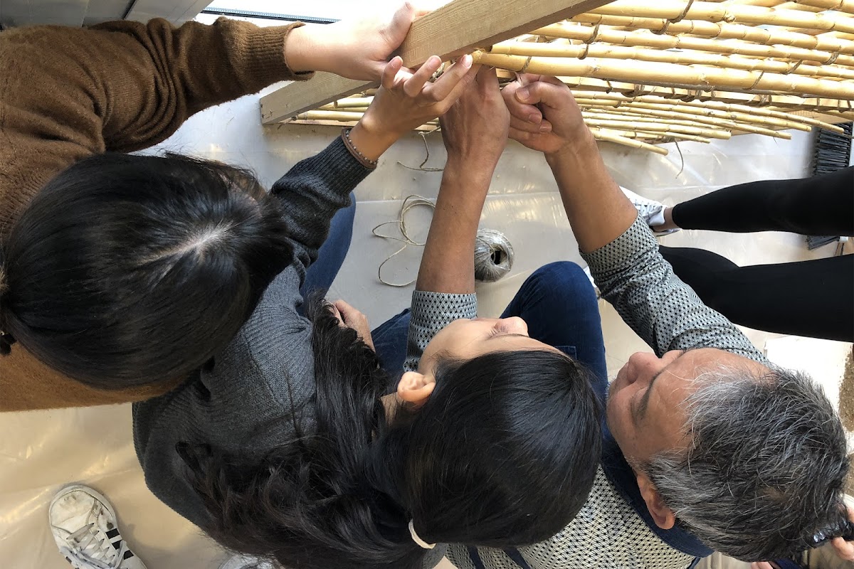 Japanese master Kennji Matsuki teaching students a hands-on technique