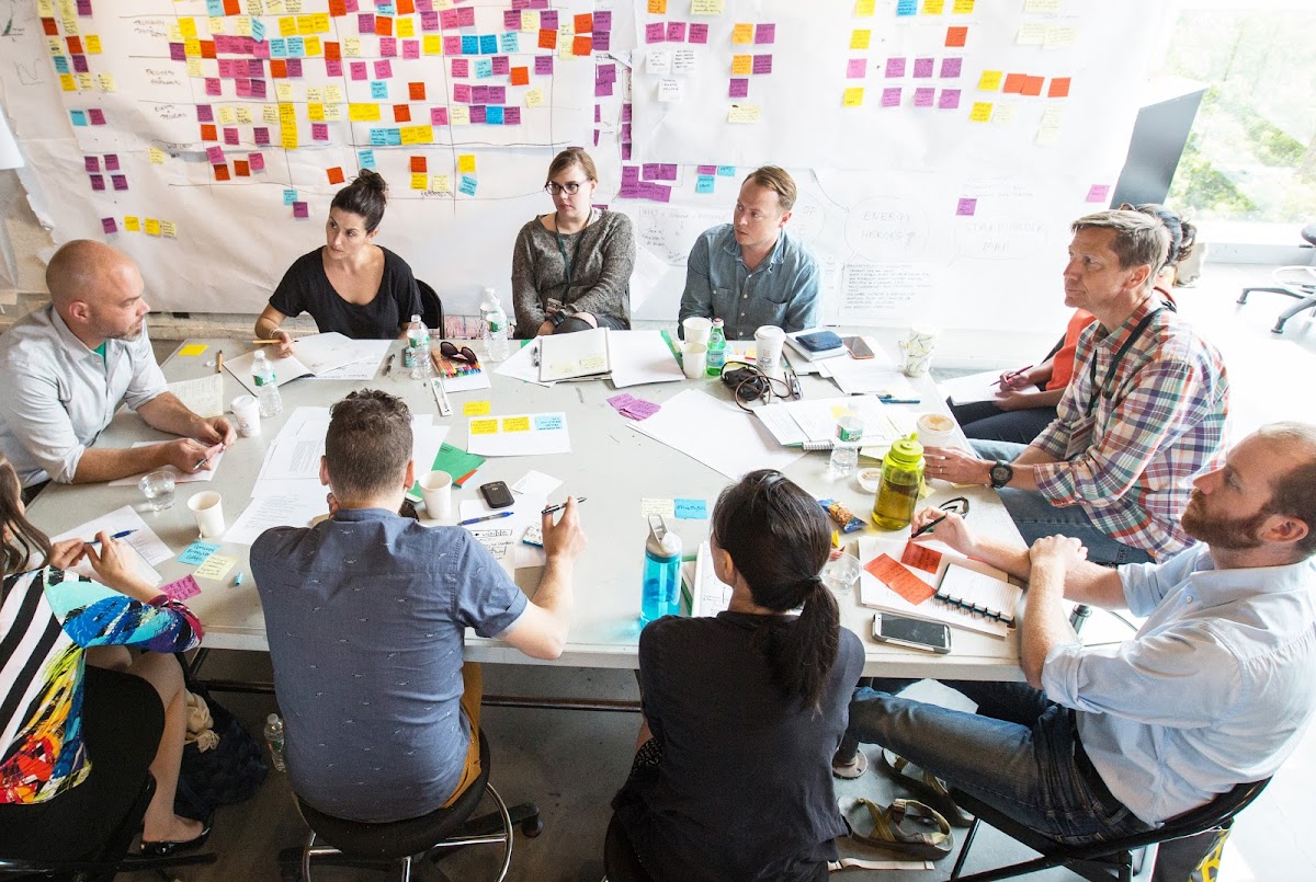 RISD Provost Fellow Justin Cook works with a team of government strategists