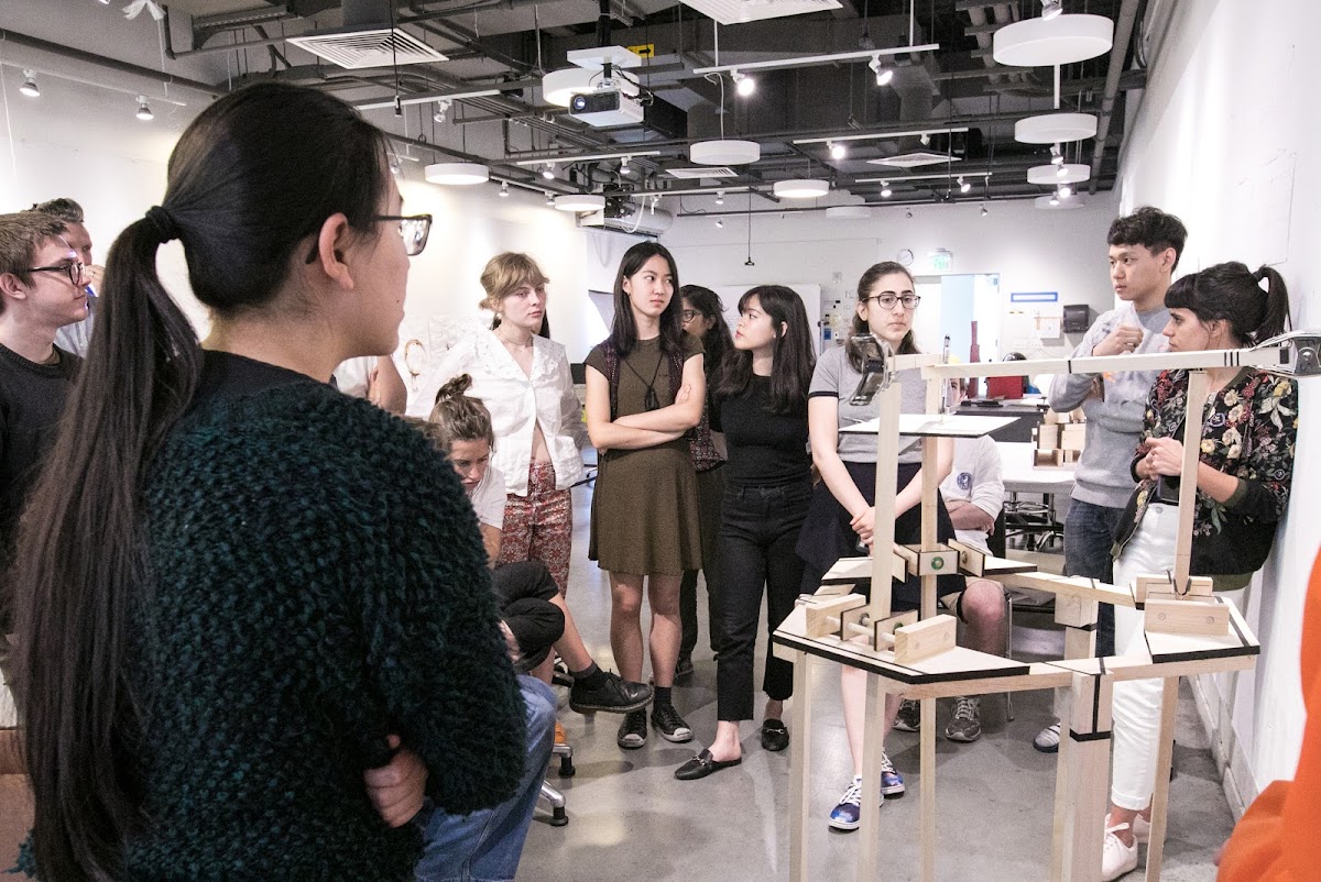 Associate Professor Paula Gaetano-Adi speaking to students in a studio class