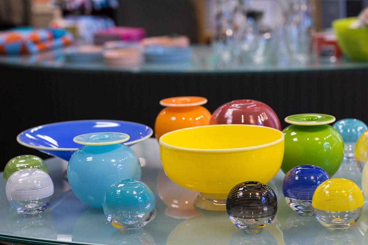 Colorful glass bowls made by RISD alumni on display in the RISD Store