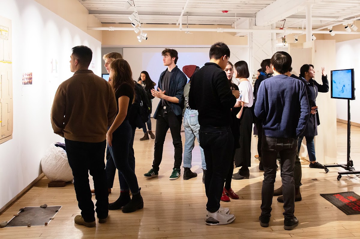 Crowd of students viewing ODD SUM, the first Architecture exhibition in the series
