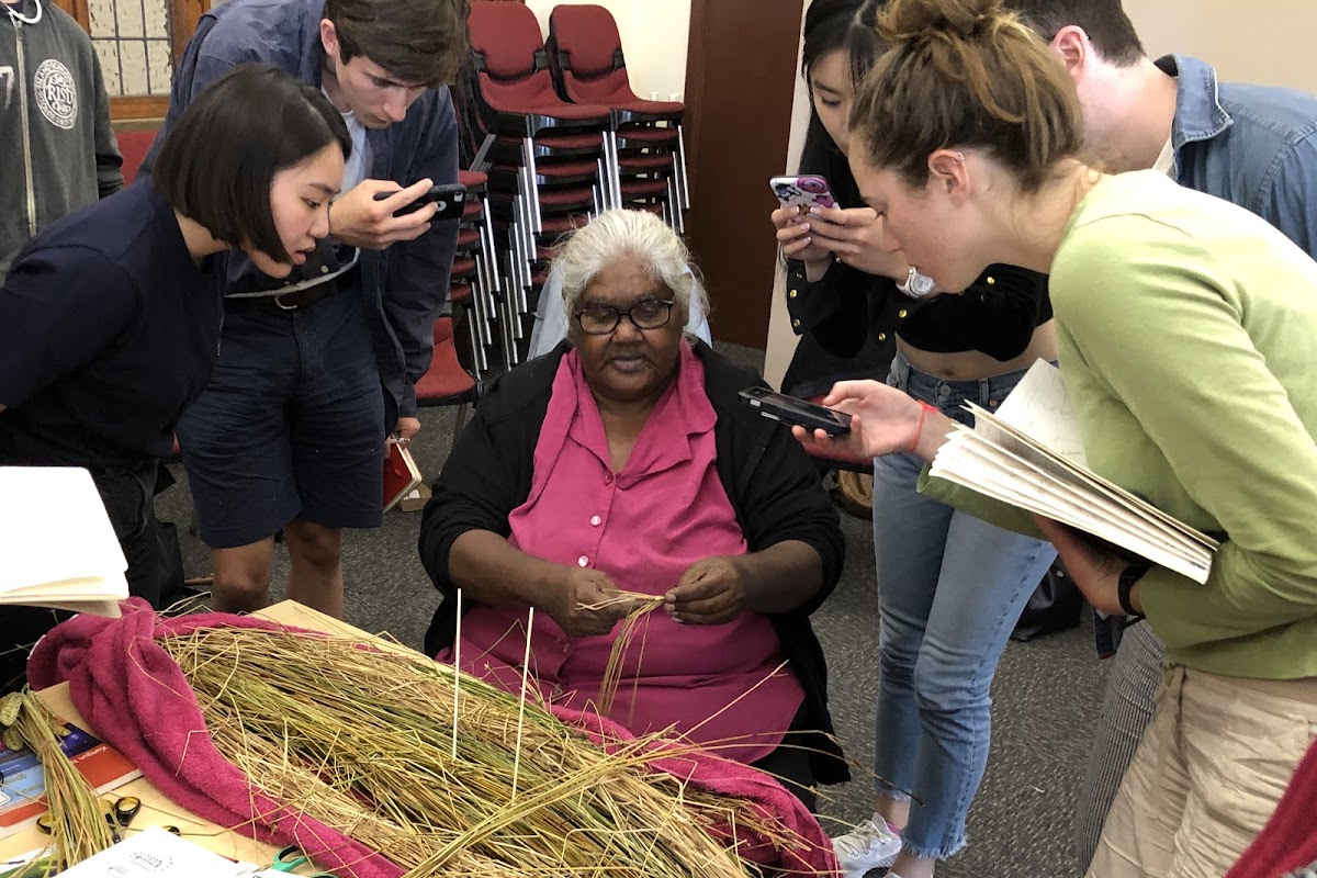 Indigenous artisans with students