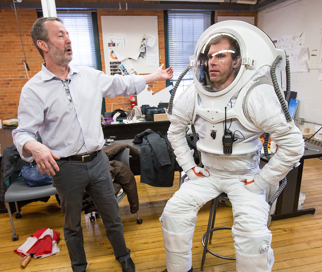 Michael Lye 96 ID with HI-SEAS crew member Andrzej Stewart in a modular space suit