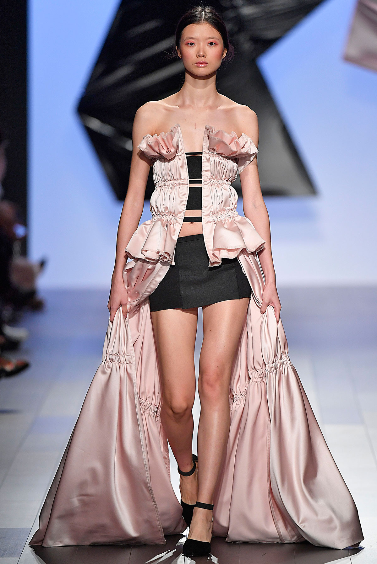 Model on runway wearing a piece from the Pink Champagne collection presented by Taylor Goldenberg 17 AP