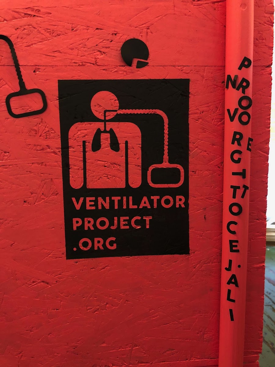 ventilatorproject.org logo spray painted on wooden wall