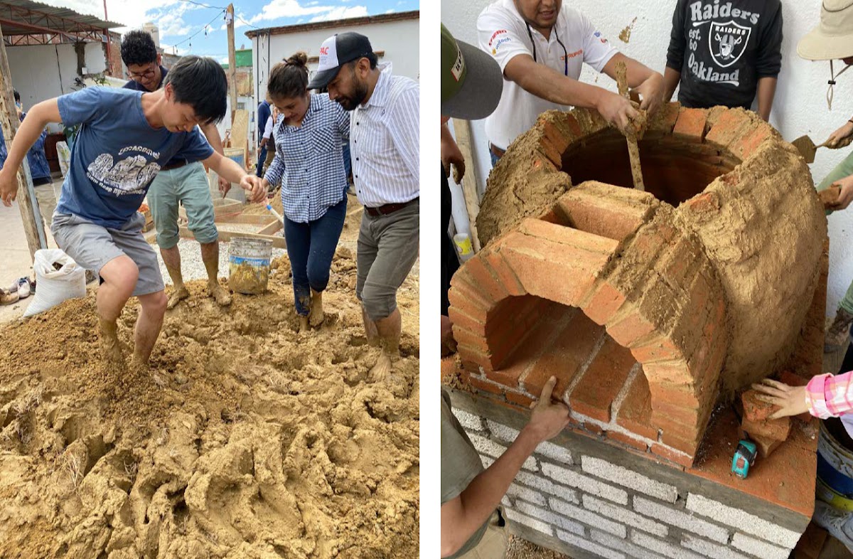 Students help to build a brick structure