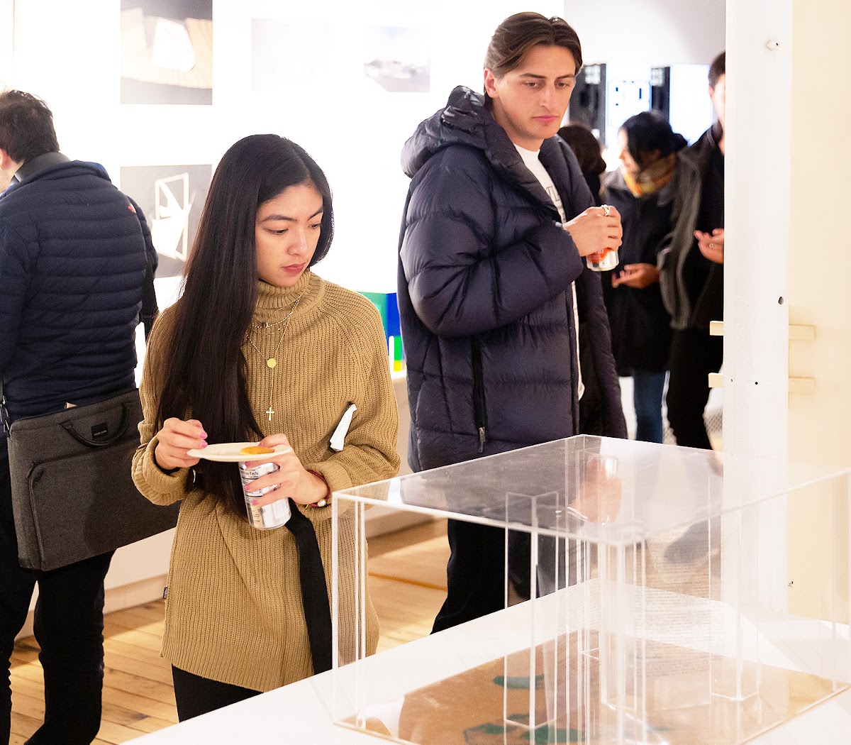 Students viewing architecture exhibition