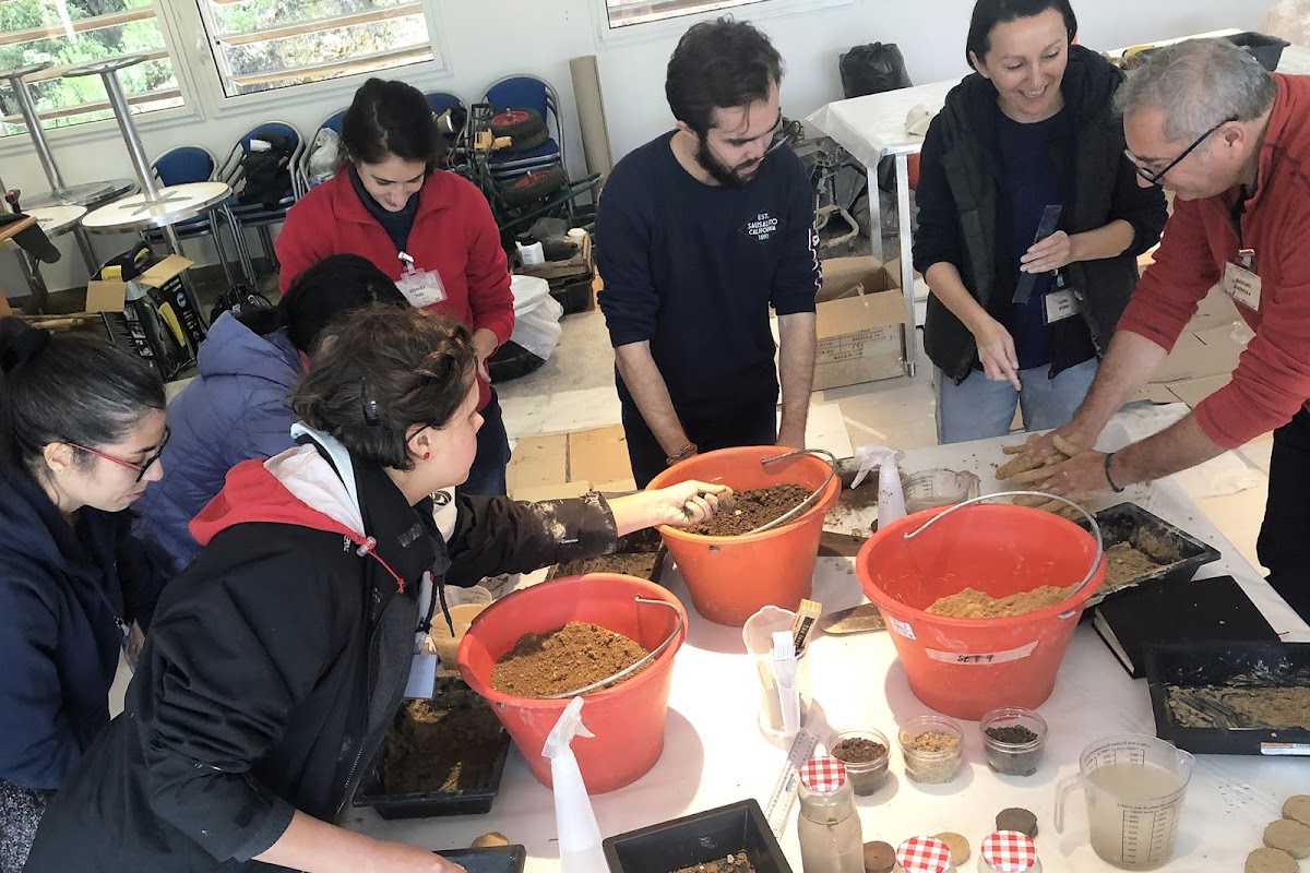 Students working with different types of soil