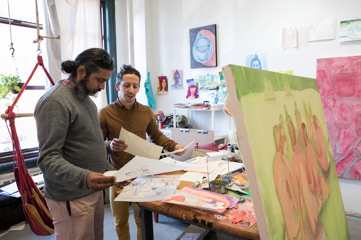 People discussing work in a studio