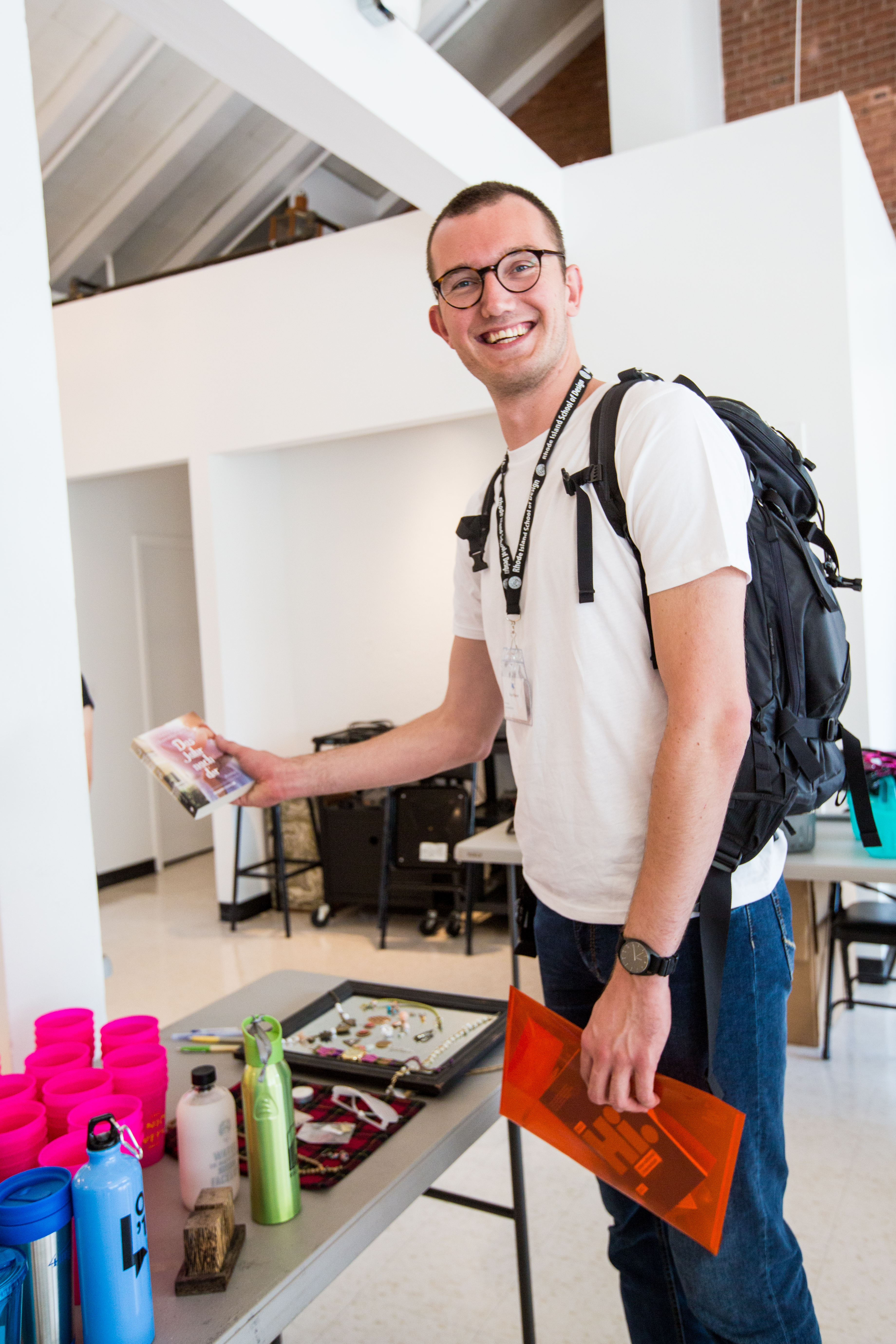 Viktor Hübner MFA 19 PH finds a German-language novel at the international student “yard” sale