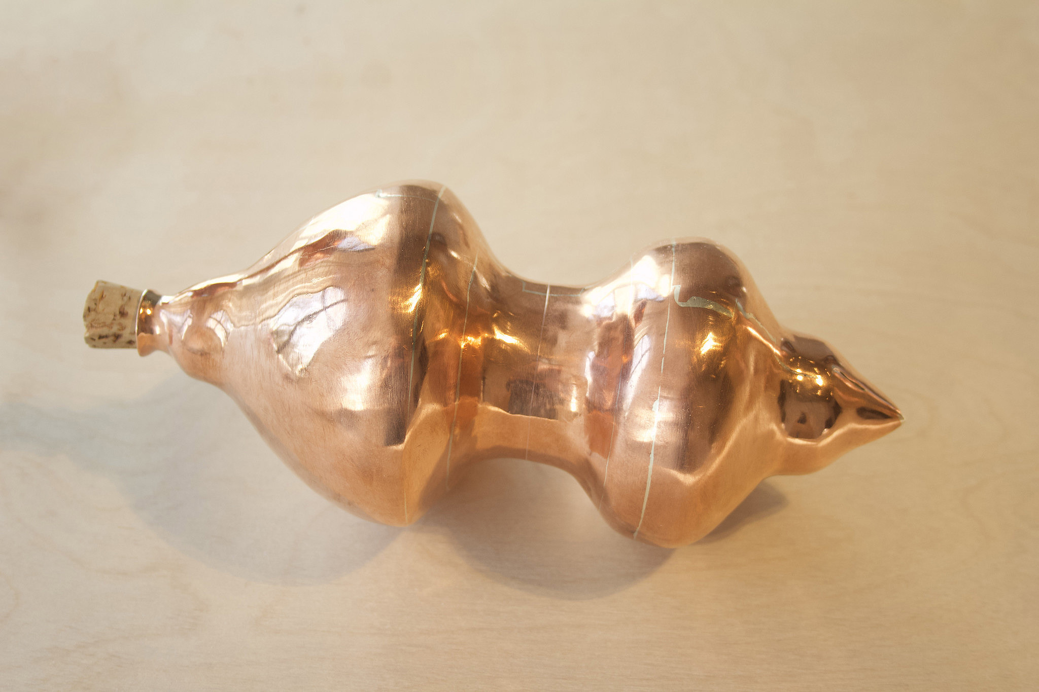 uniquely shaped copper vessl
