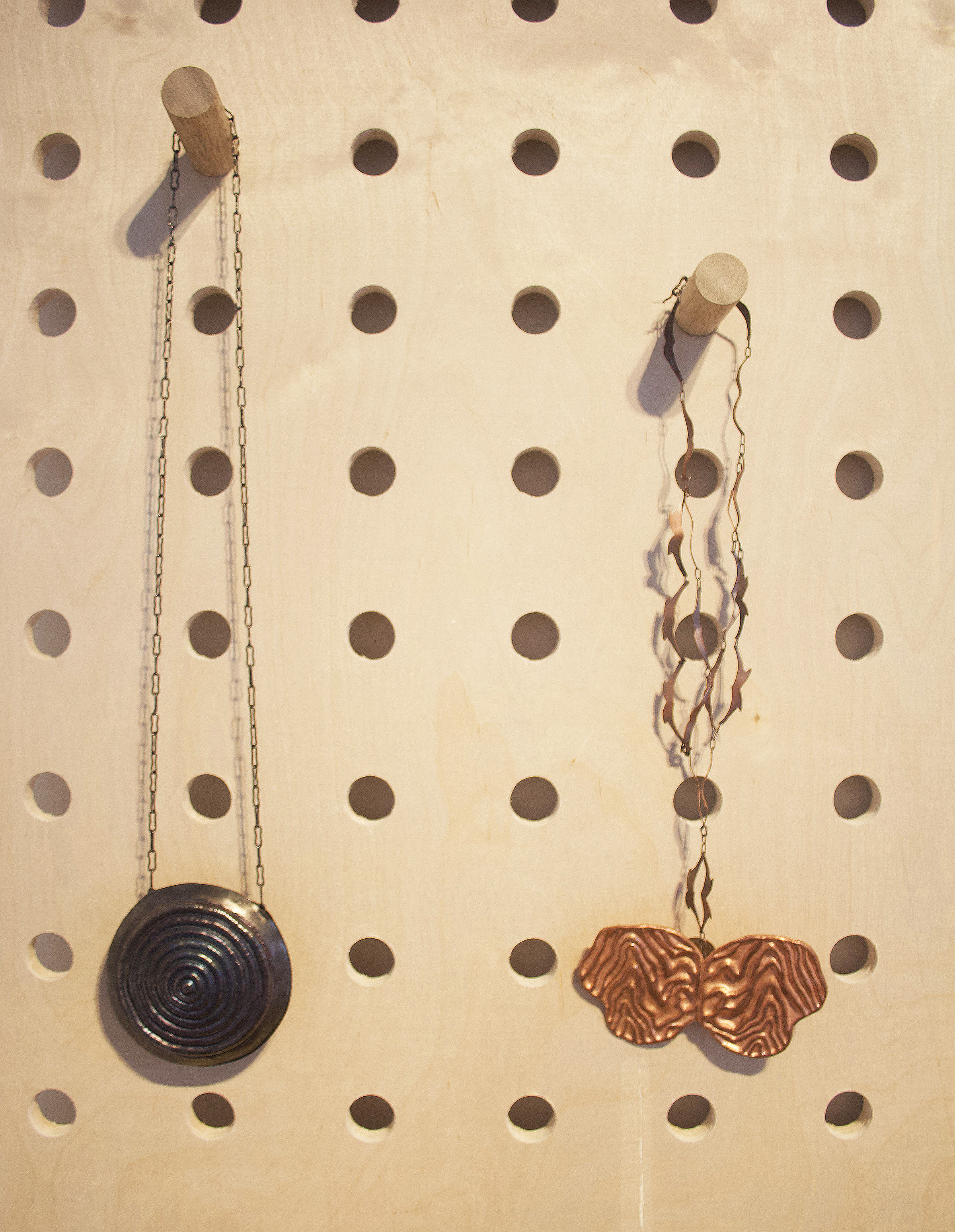 two hanging pendants by juniors