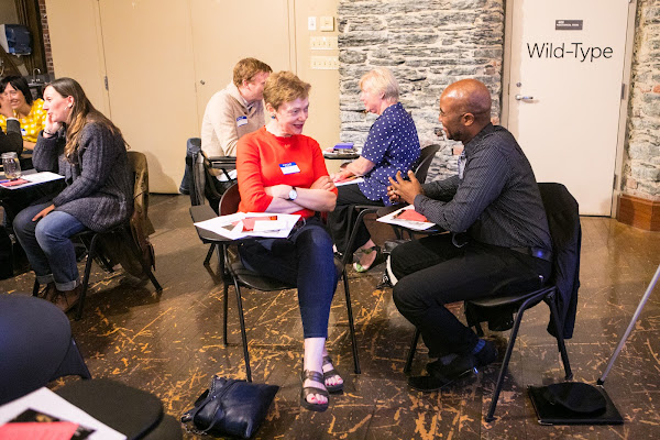 Professor Mairéad Byrne and Assistant Dean of Student Affairs Tony Johnson 93 SC talk during a workshop for faculty and staff