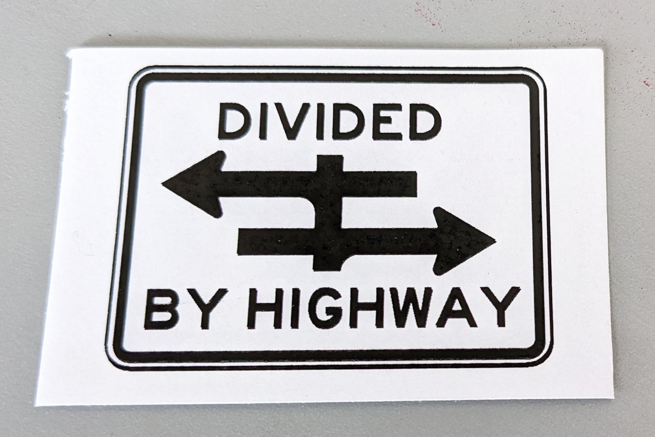 Divided by Highway sign