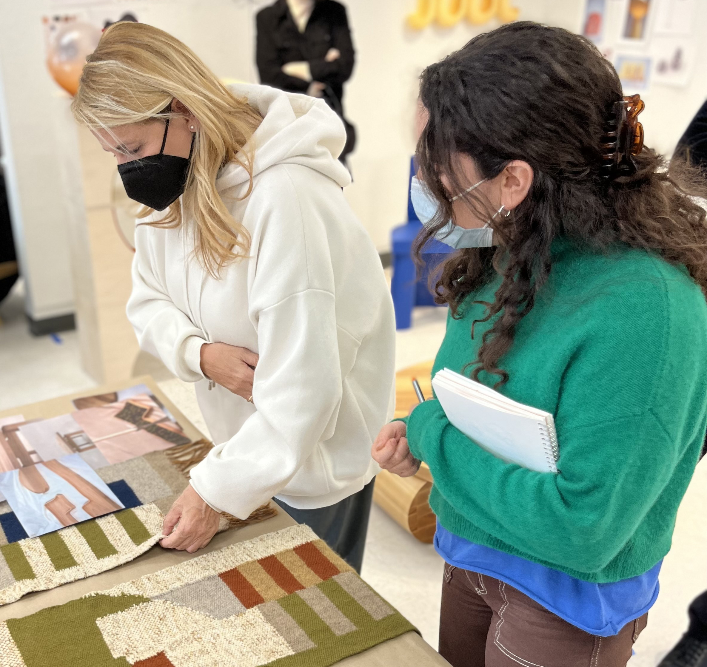 Urquoila and a student in the studio