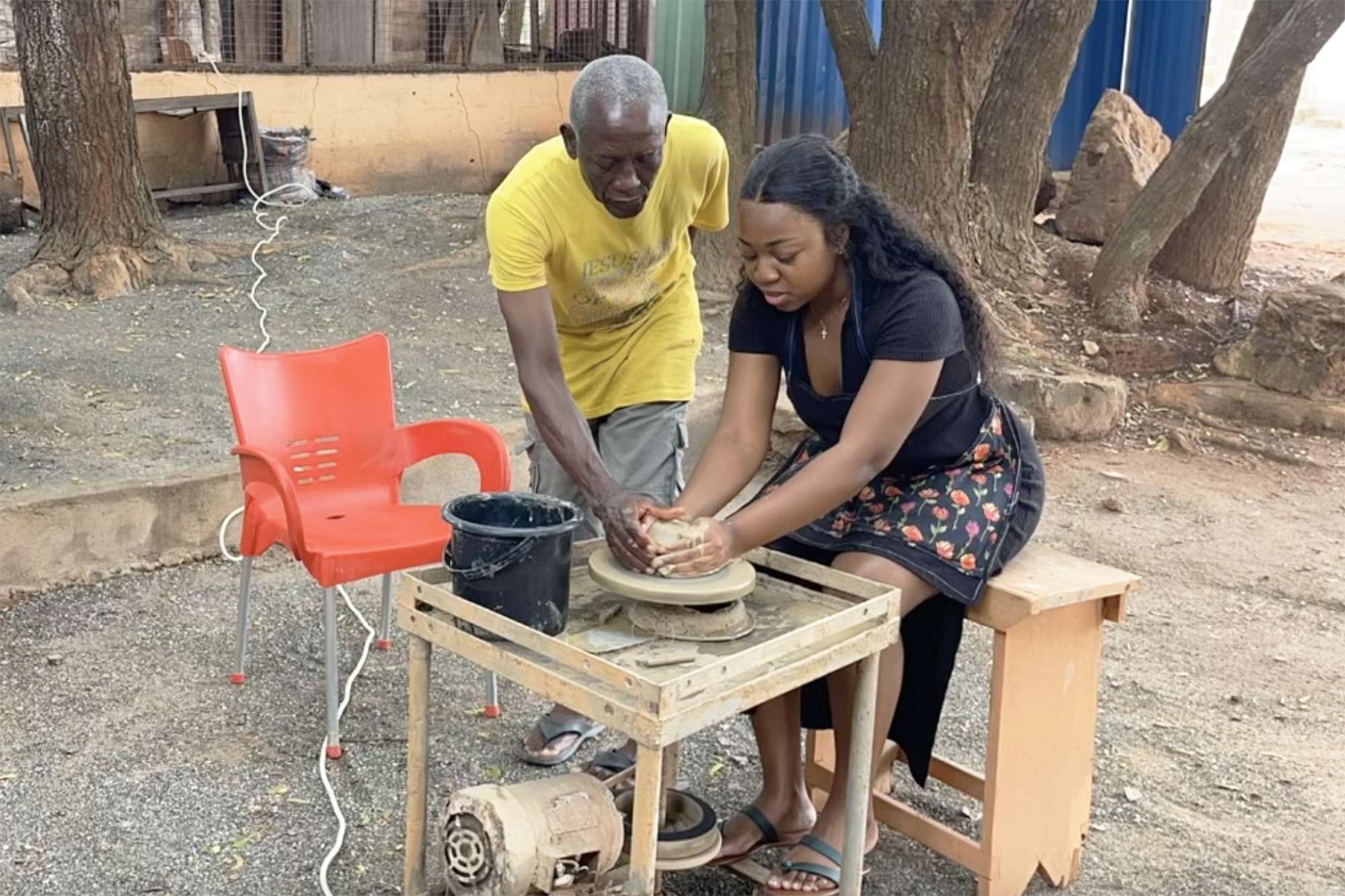 Danqua learns ceramics with local artisan