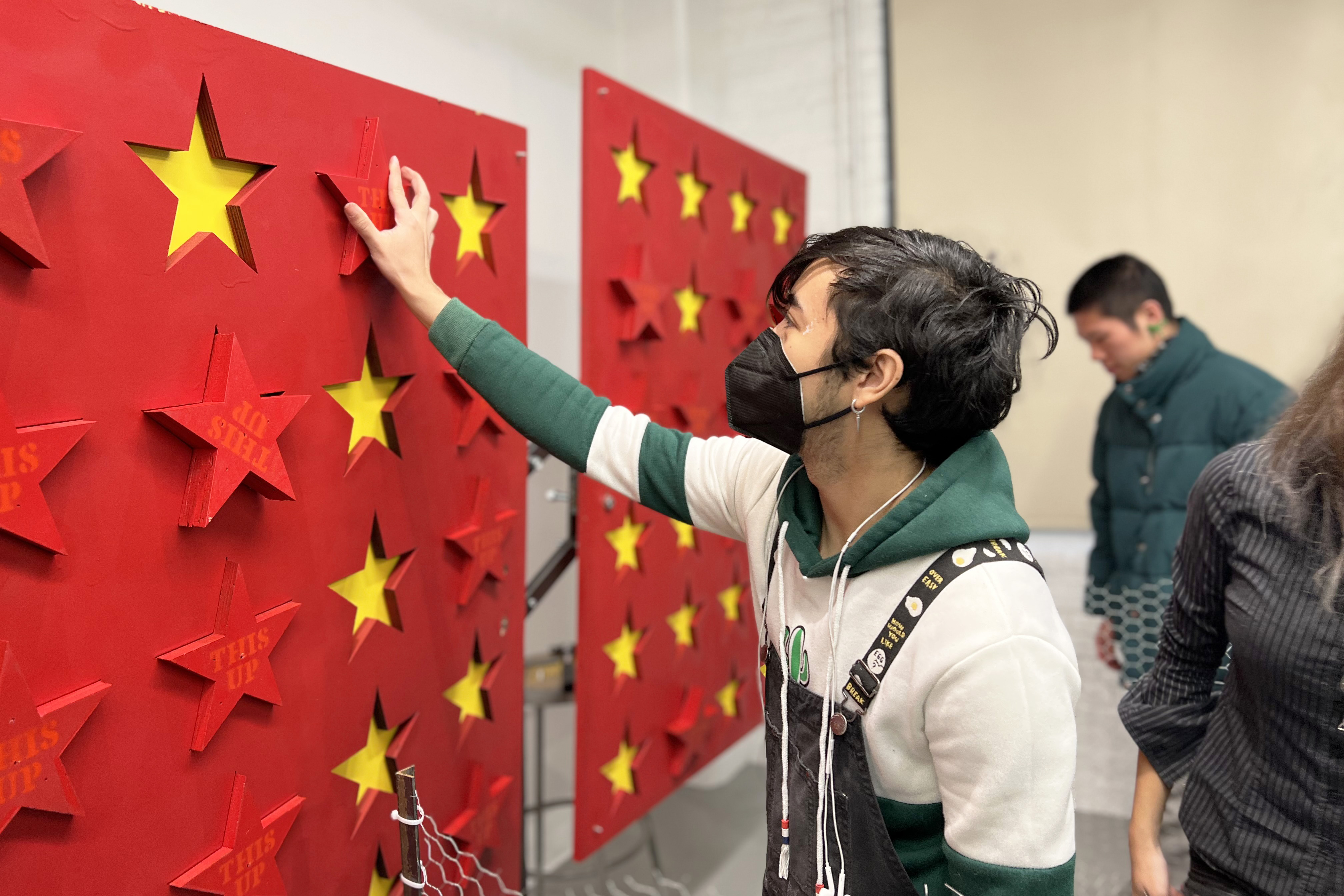 a student interacts with a piece 