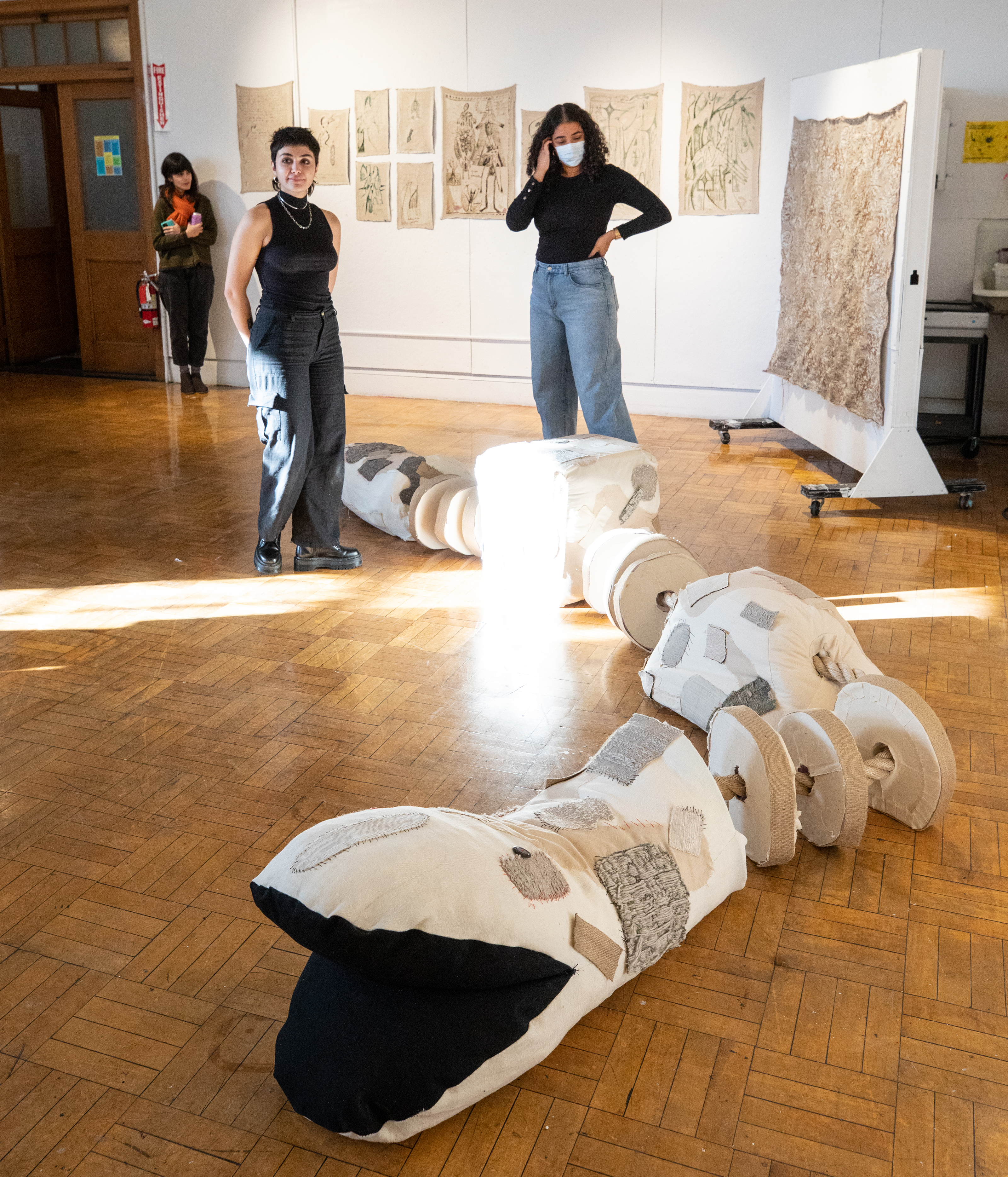 Textiles student Larissa Celi shows a giant snake