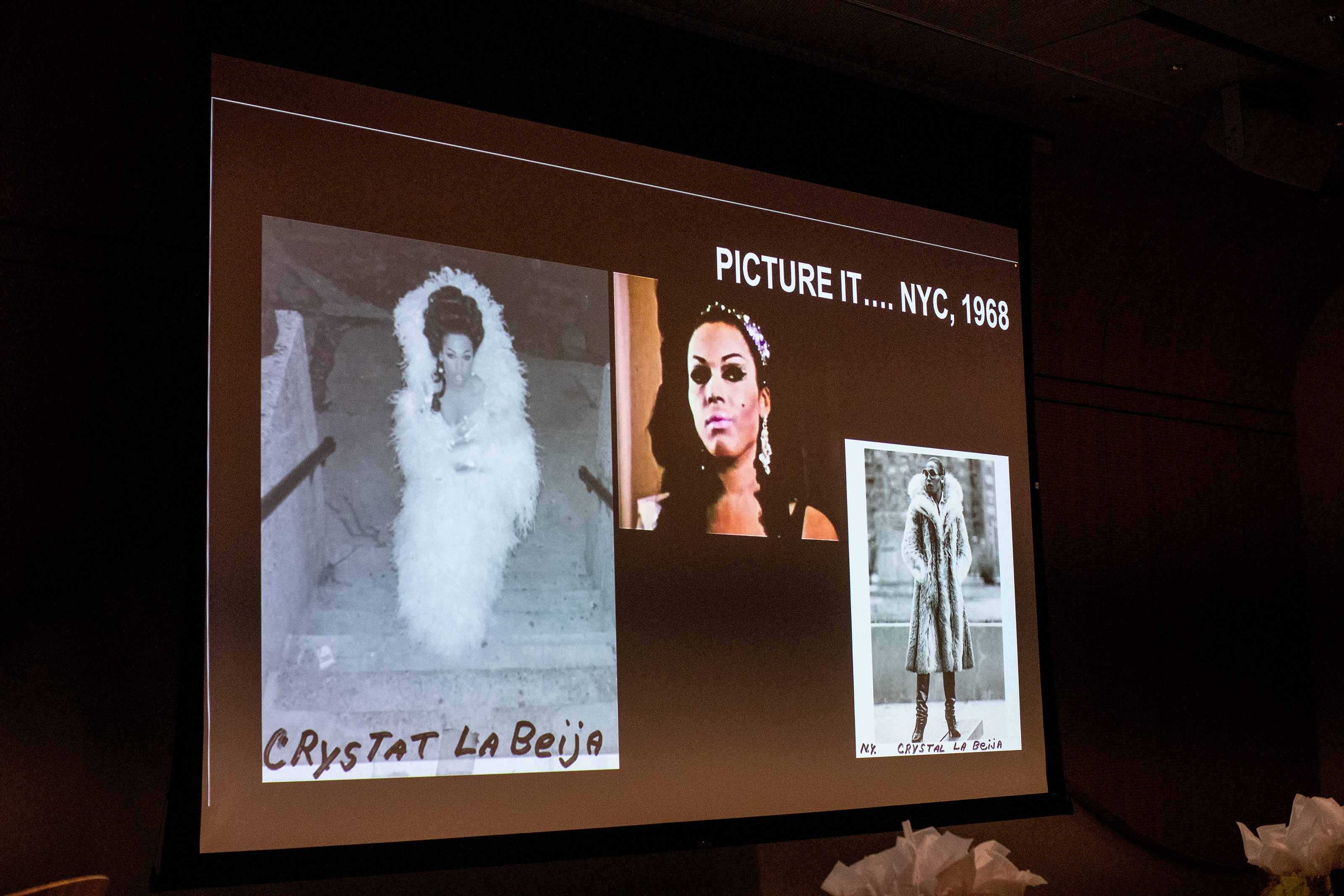 Photos and video clips of Crystal LaBeija projected in the Washington Place Auditorium