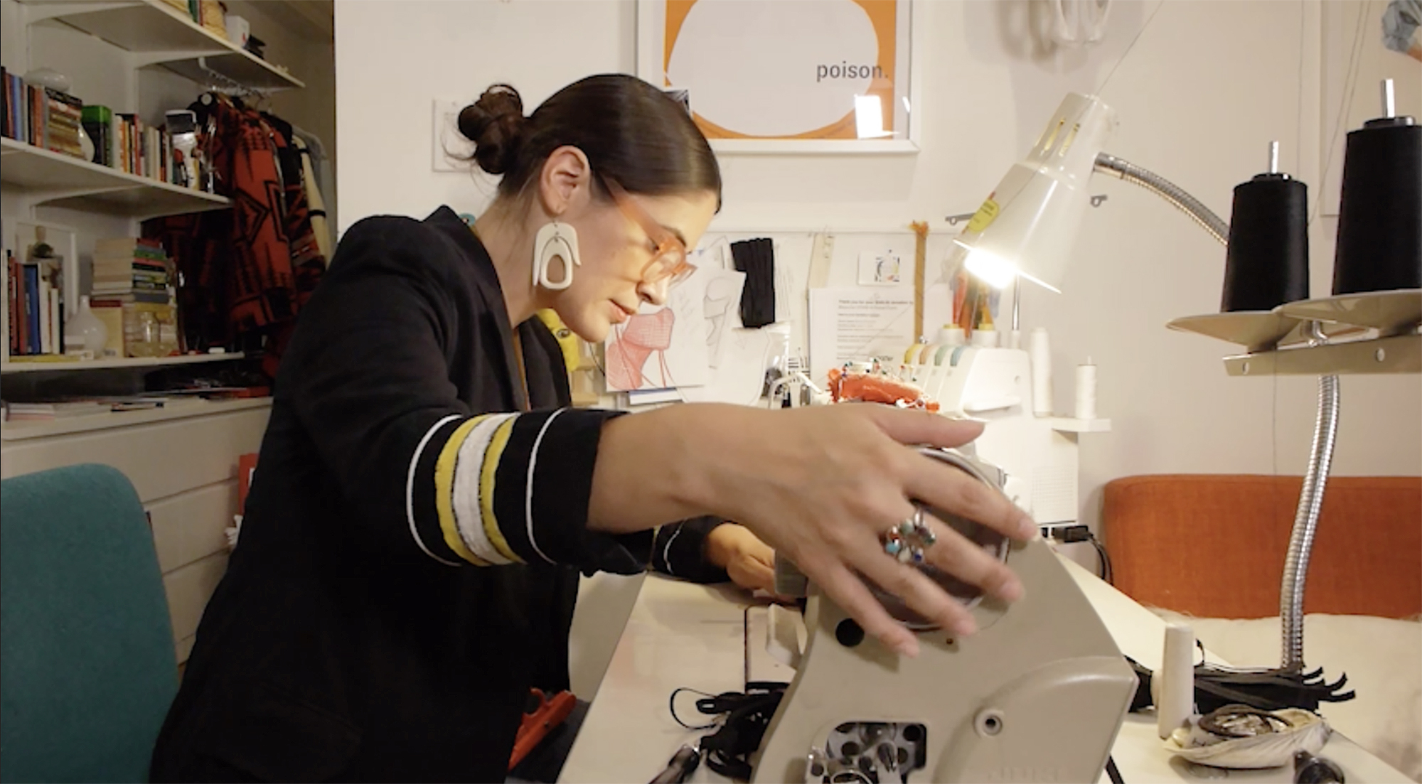 Emmerich sewing in her Brooklyn studio