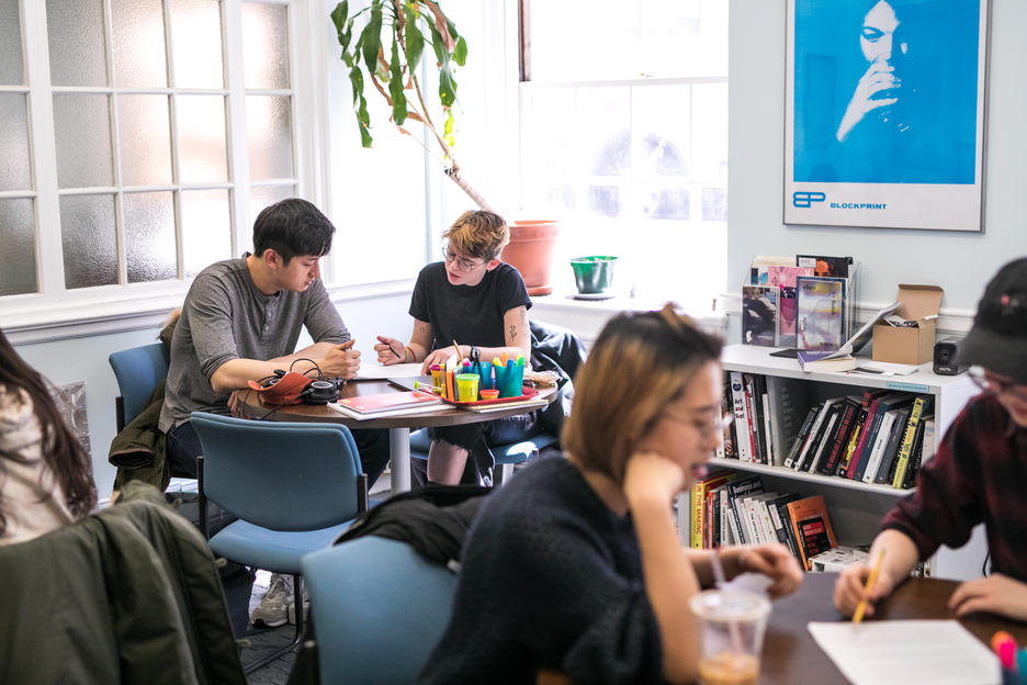 a student works with their tutor inside RISD’s Center for Arts & Language