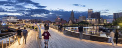 people walking on the pedestrian bridge in downtown Providence near RISD campus