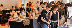 photo of people shopping at the student art sale in 20 Washington lobby
