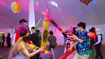 Artist Ball students in crayon costumes