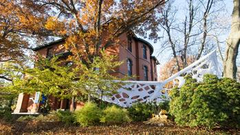 Woods Gerry Admissions Office Building with cloth installation outside