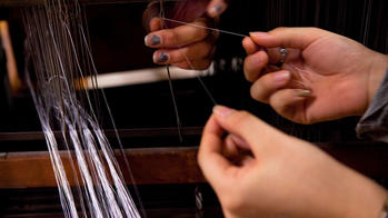 Closeup of a threading loom.