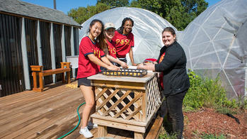 Students volunteering at the Southside Community Land Trust