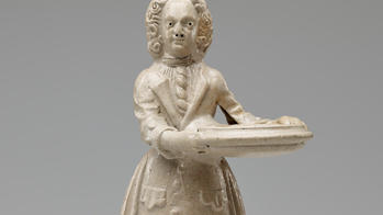 figure of a servant holding a tray