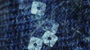 detail of blue knitted garment