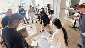 students and faculty working together in the Center for Complexity