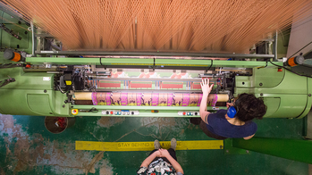 Overhead view of a working loom