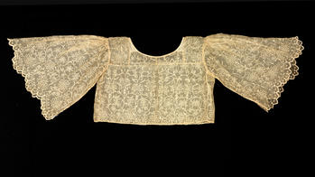 lace top against black background