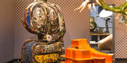 Misha Kahn’s Scrappy Cabinet, made from trash and woven grass,