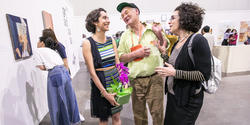 Graduating student Arghavan Khosravi MFA 18 PT, Professor of Painting Dennis Congdon 75 PT, and President Rosanne Somerson 76 ID at the opening reception of the thesis exhibition