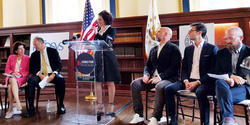 President Rosanne Somerson 76 ID explains, in a press conference, RISD's role in a pioneering partnership with Infosys